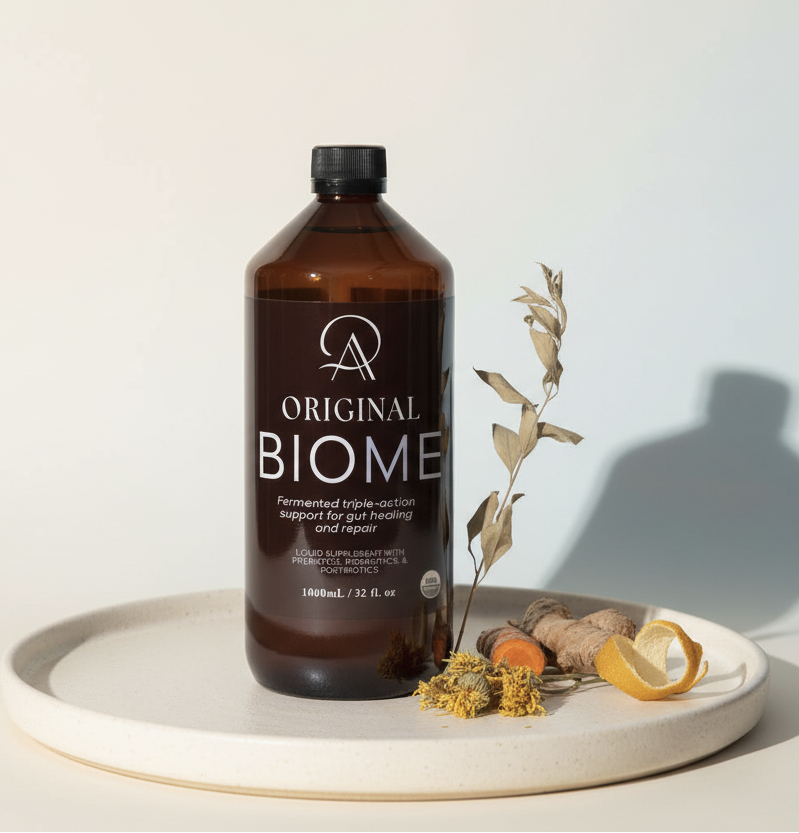 Brown bottle labeled 'Original BIOME' on a white surface with decorative elements.